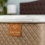 Close-up of orange Evermore mattress tag